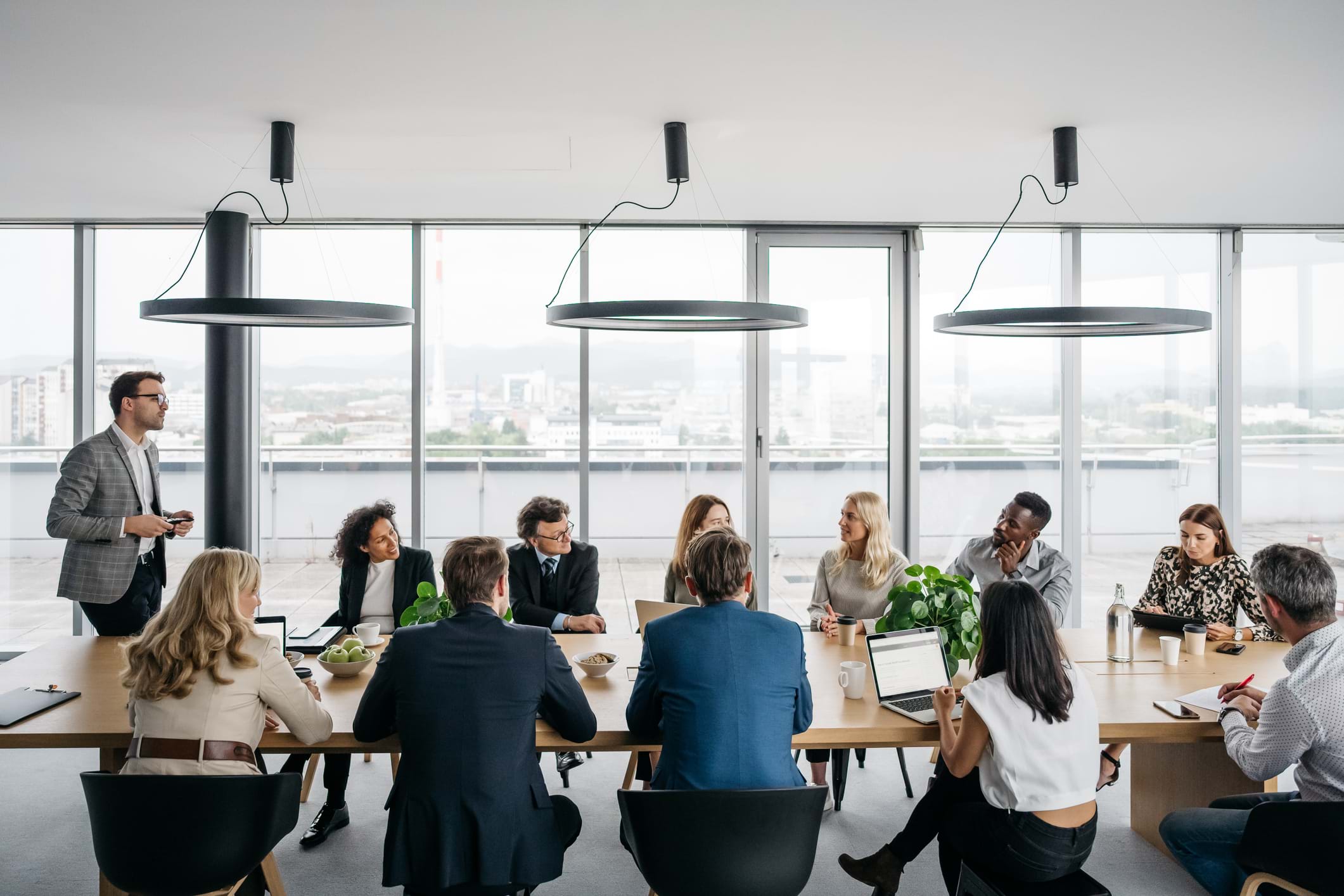 A group of people sat around a table